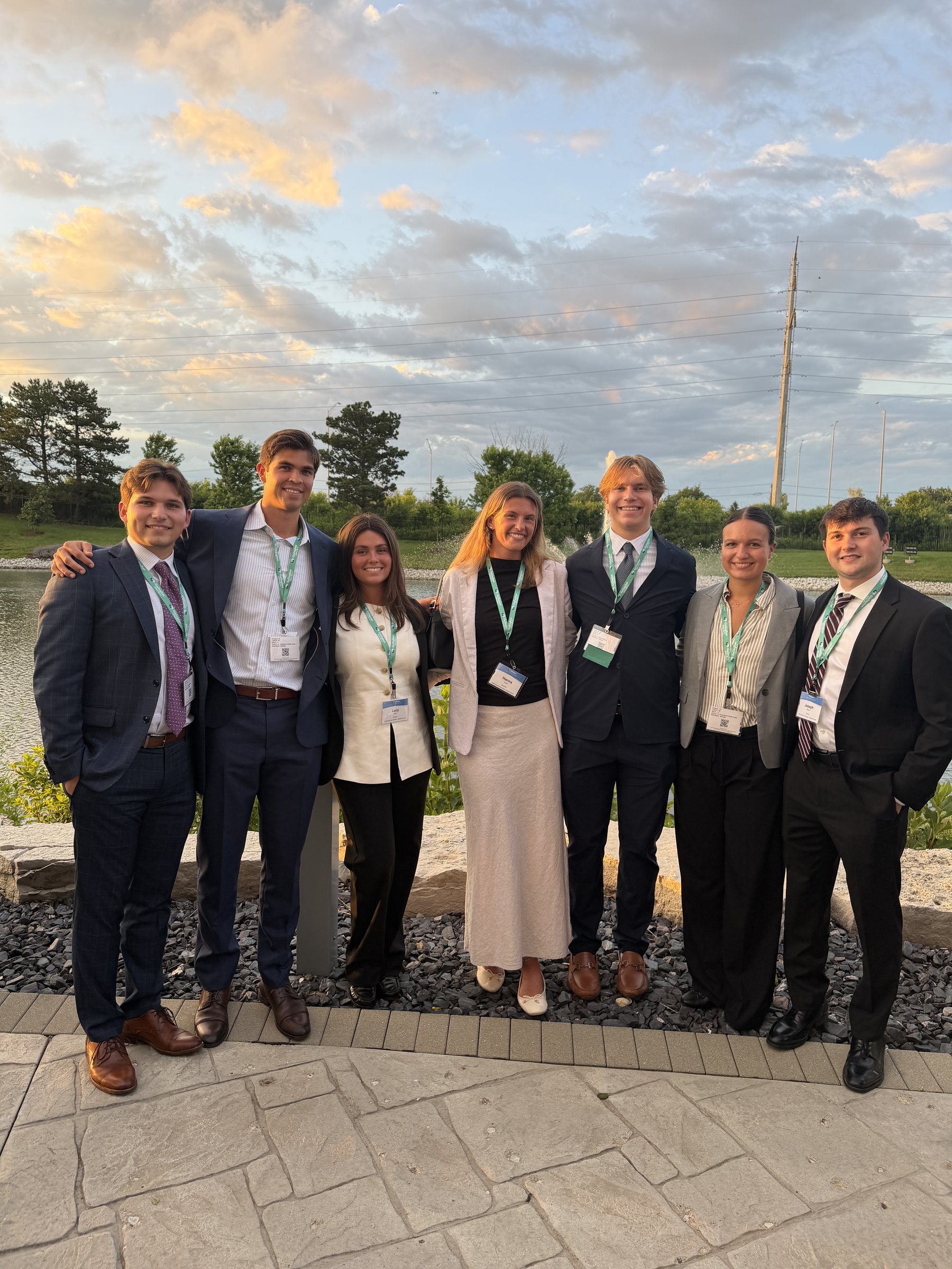 Cooper Carlsen with the Gallagher intern class at sunset
